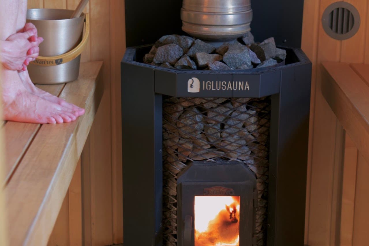Inside the Estonian sauna. The water will be poured to the hot stone to create "leil" (an Estonia word for hot steam made by pouring the water to the hot stone).