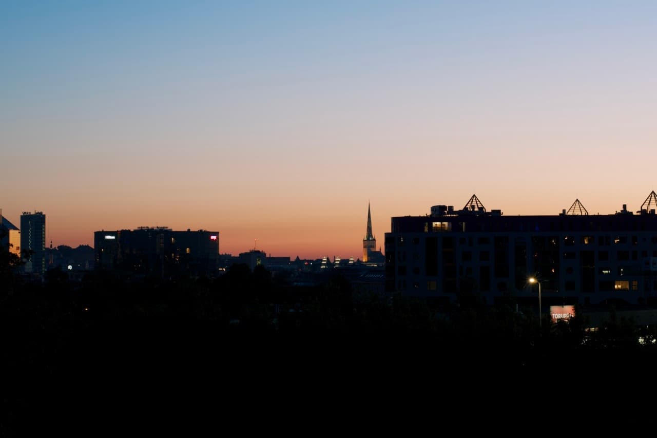 Tallinn city's skyline in the Midsummer's eve. It is the time when dusk meet dawn, because the sun doesn't really set. The photo was taken at 00:30.